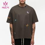 Hucai biểu tượng tùy chỉnh Heavyweight hộp phù hợp với Breakout bướm đồ họa in ấn cổ điển quá khổ cổ điển phòng tập thể dục t Áo sơ mi cho nam giới